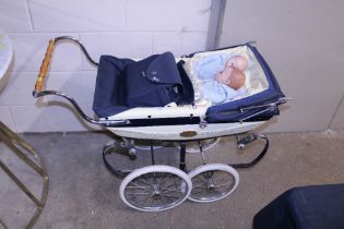 A Silver Cross No.373 dolls pram and two dolls