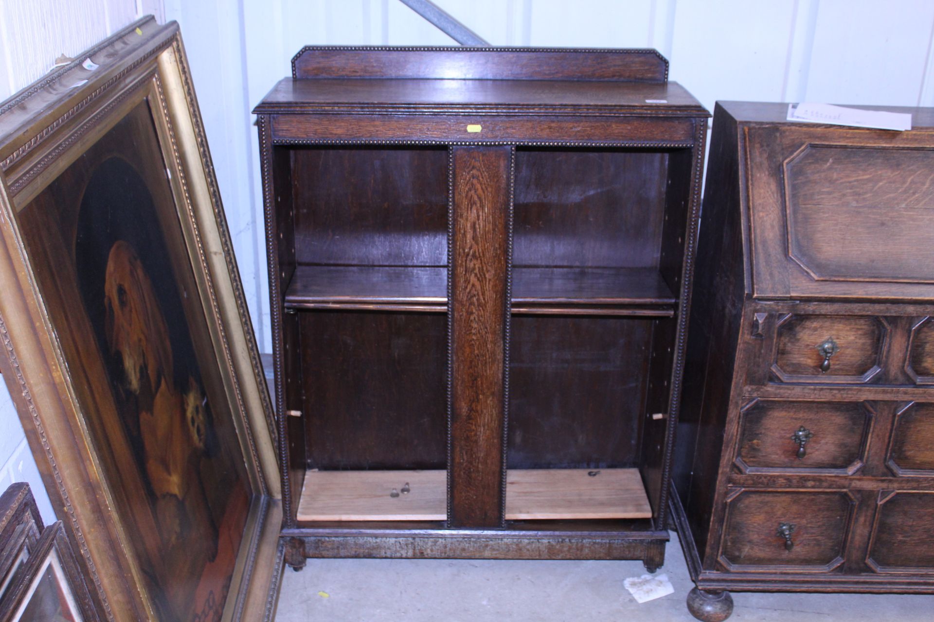 An early 20th Century oak open fronted bookcase