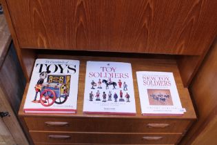 Three reference books on toys and toy soldiers