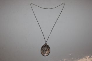 London SAO 1969 large Sterling silver locket and c