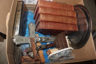 A box of miscellaneous items to include books, rel