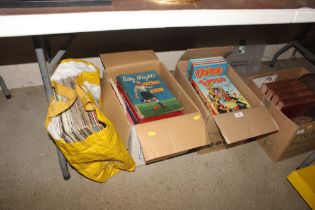 A collection of various children's annuals and foo