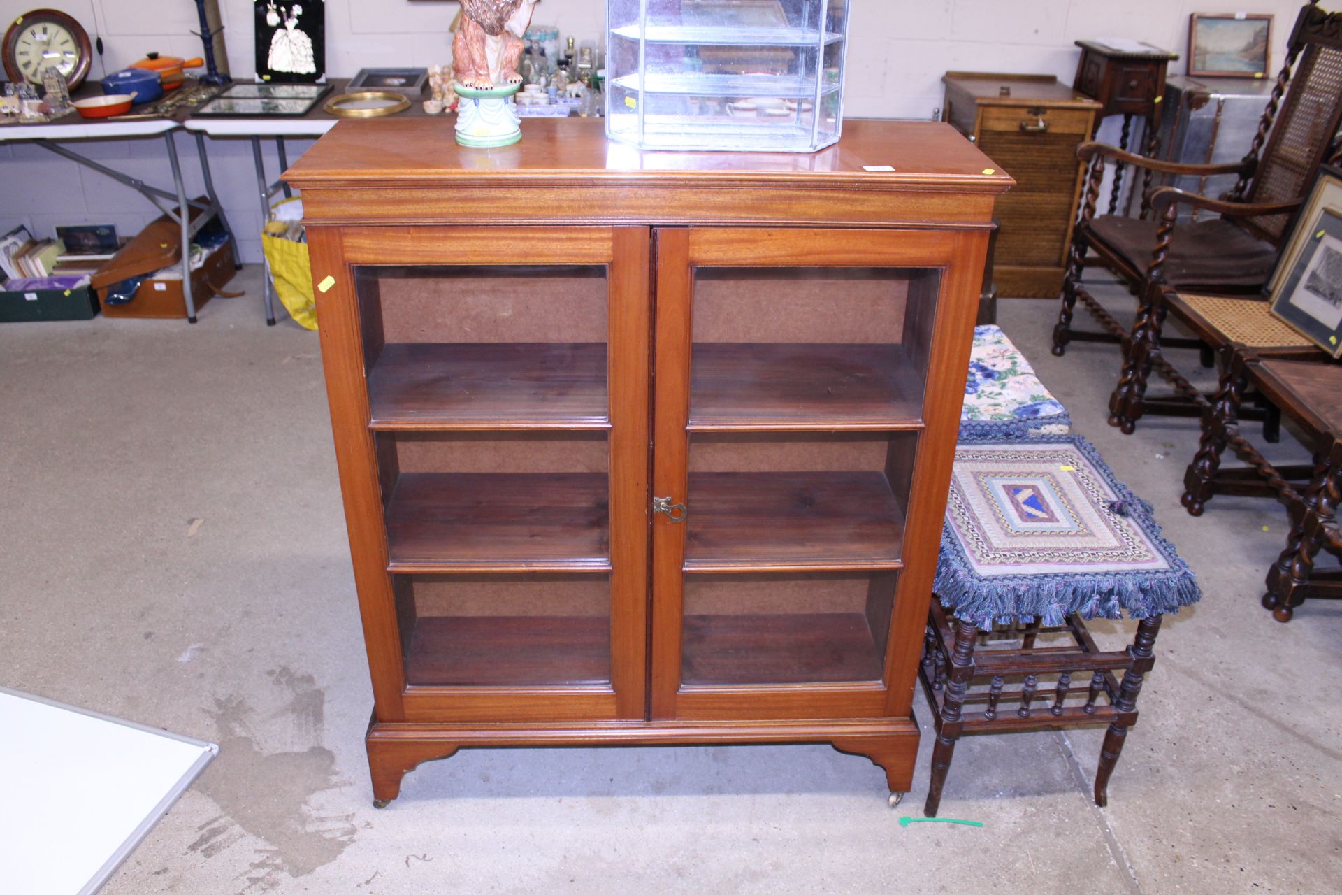 A mahogany china display cabinet