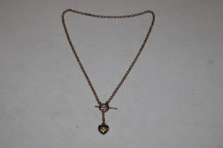 A 9ct gold watch chain with T bar and attached hea