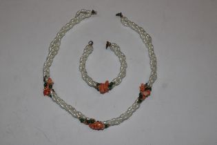 A freshwater pearl necklace and bracelet
