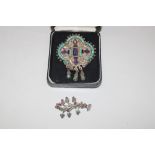 A large Mexican silver brooch set with amethyst an