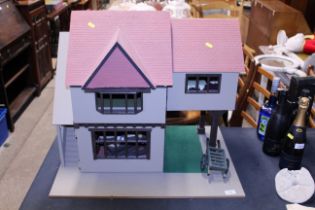 A dolls house and some contents