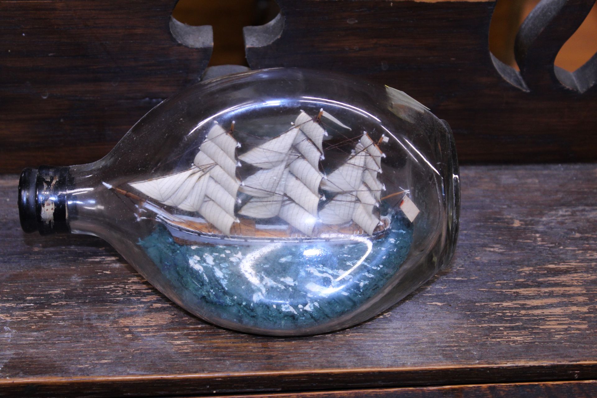 A finely modelled schooner set into a Haig Dimple