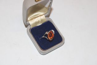 A Sterling silver and amber ring, ring size N/O