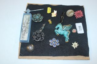 A quantity of various brooches including turquoise