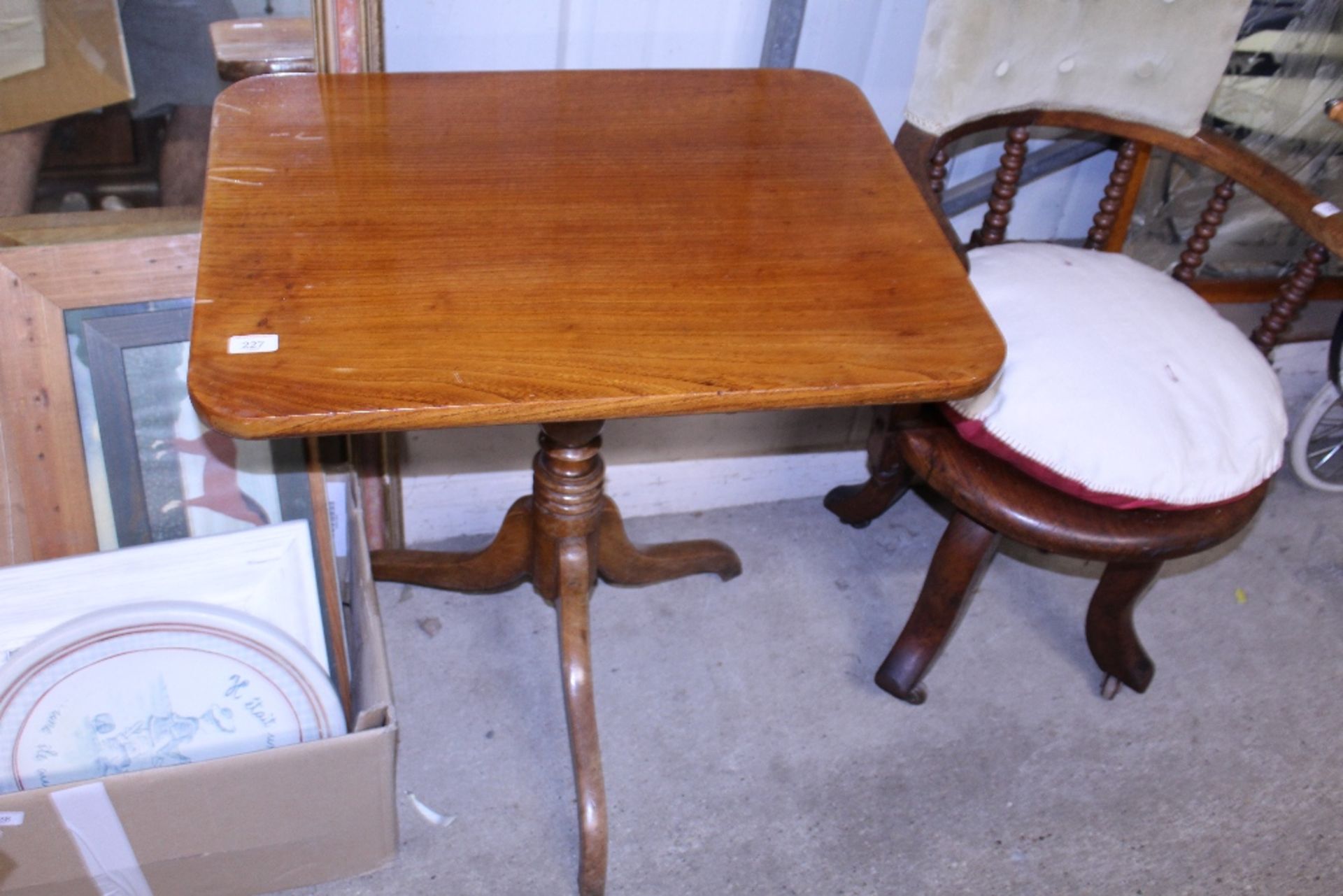 A 19th Century elm tripod occasional table