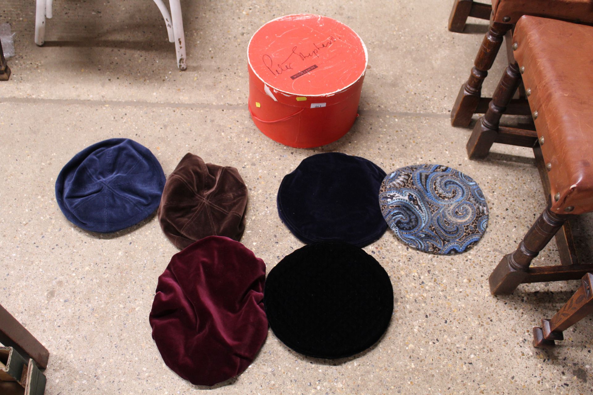 A hat box and contents of berets