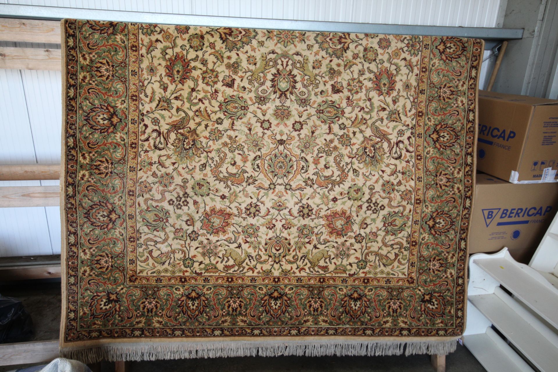 Approx. 9'9" x 6'7" floral patterned rug