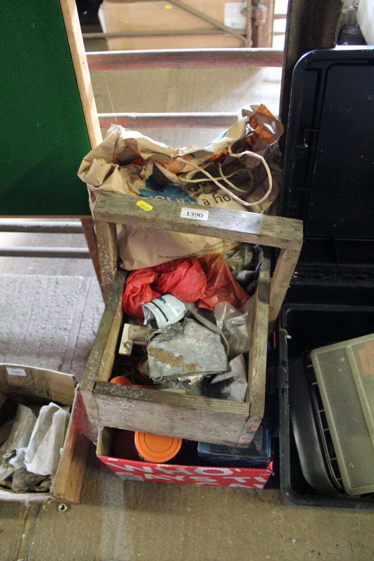 A wooden garden trug basket and a box containing v