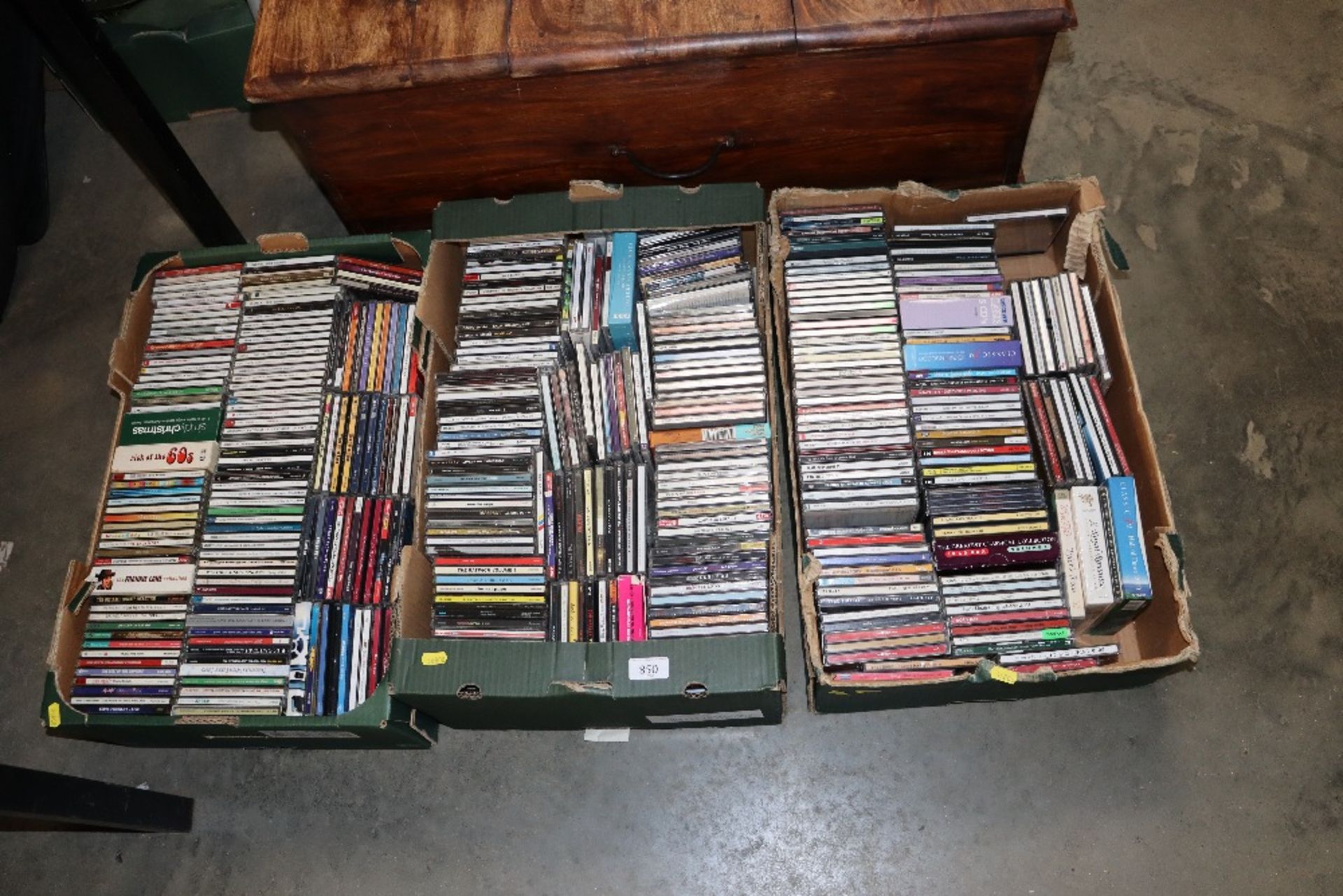 Three boxes of various CDs