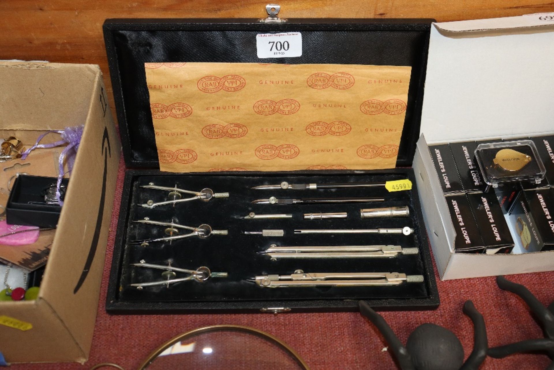 A cased set of drawing instruments