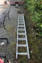 A double extending aluminium ladder