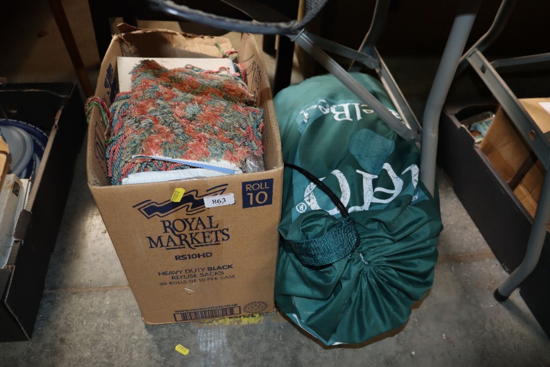 An Aero travel bed and a box of linen, lace and br