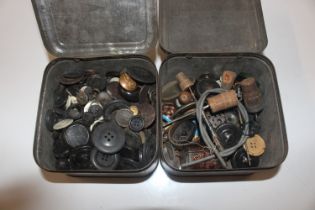 Two boxes containing various tins, scent bottle, m