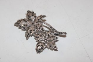 A vintage silver and marcasite flower brooch, appr