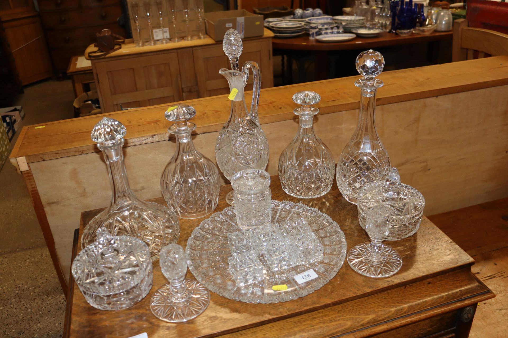 A cut glass part dressing table set, decanters and