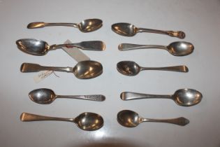 A set of eight silver spoons and ten various silve