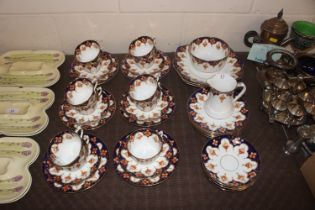 A quantity of Royal Albert floral and gilt pattern
