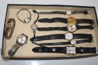 A box of various wrist watches