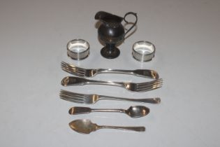 A pair of silver forks and single silver fork; a s
