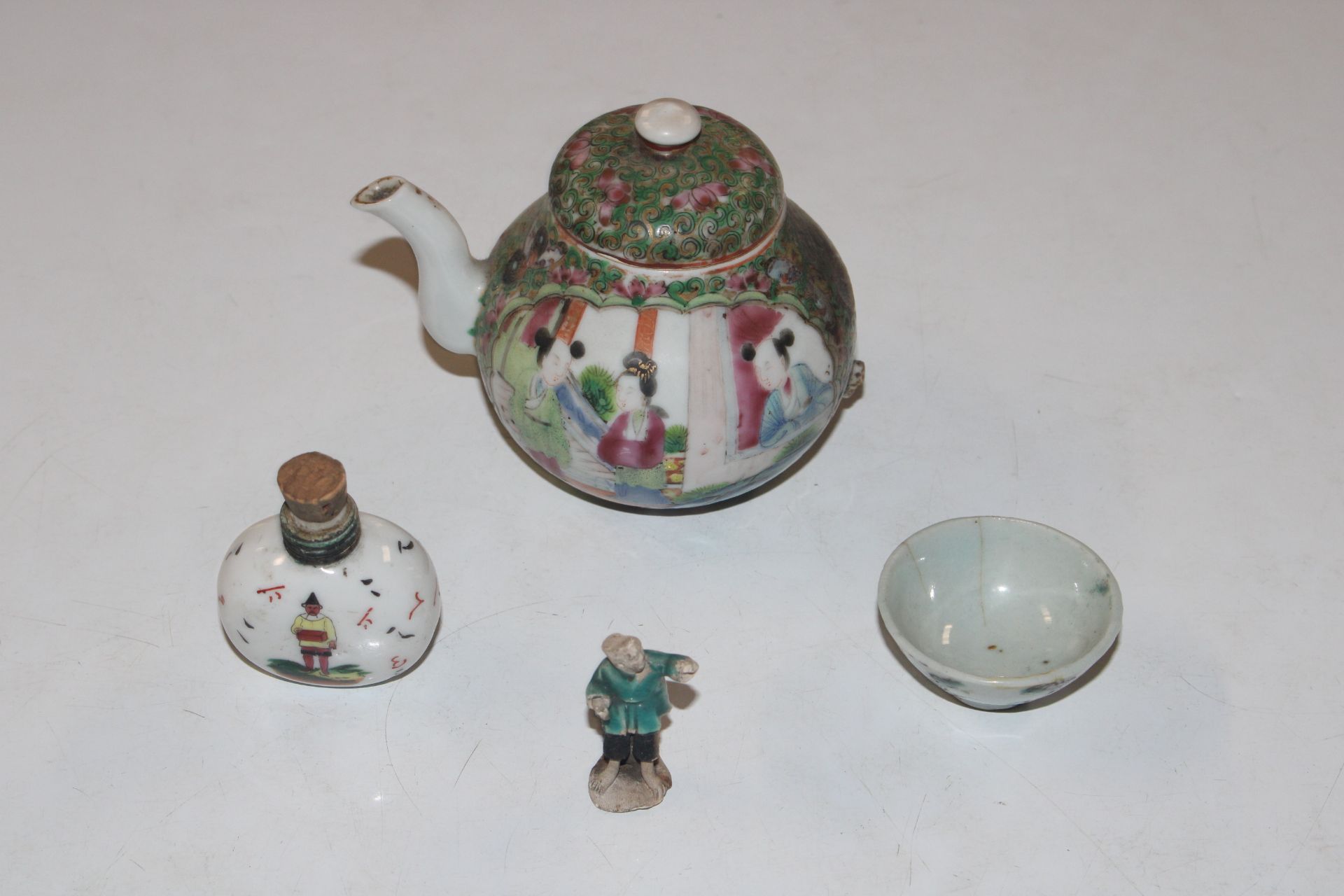 An Oriental teapot AF; an Oriental scent bottle;