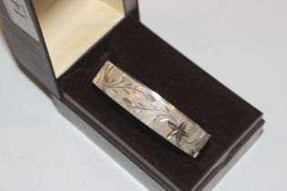 A 1977 Jubilee marked Sterling silver bangle, appr