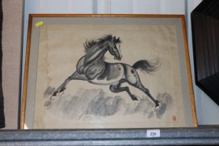 A Chinese pen and ink study of a prancing horse