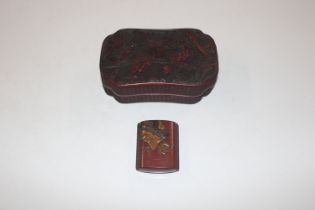 An Oriental lacquered inro and a red lacquer box a