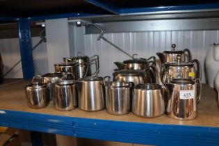 A quantity of stainless steel tea and coffeeware