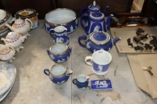 A Wedgwood Jasperware teapot, sugar bowl, cream jug with silver rim and various other Jasperware