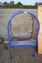 A Gallizzi metal bird cage on wheeled base
