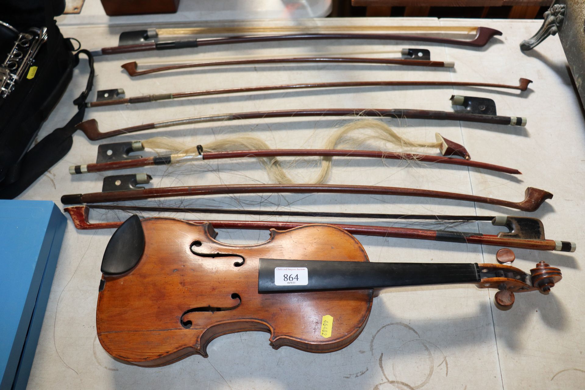 A Violin and collection of bows