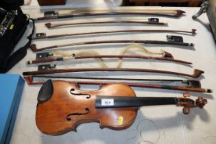 A Violin and collection of bows