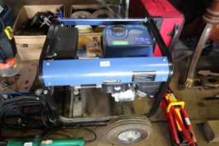 A Power Craft 3200DV petrol generator on trolley b