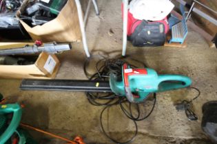 A Bosch AHS40-24 electric hedge trimmer