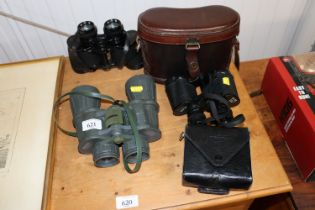 Four pairs of binoculars