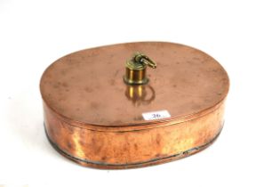 An antique copper and brass bed warmer