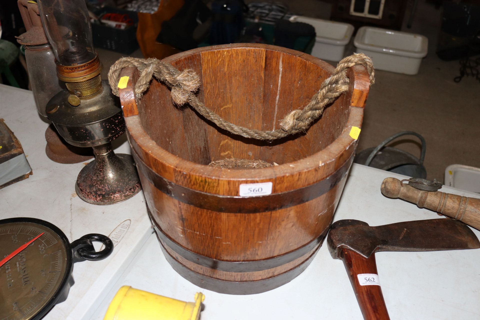 A well pail with rope handle