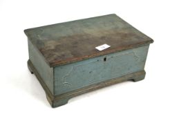 An antique painted wooden and marbleised lined box