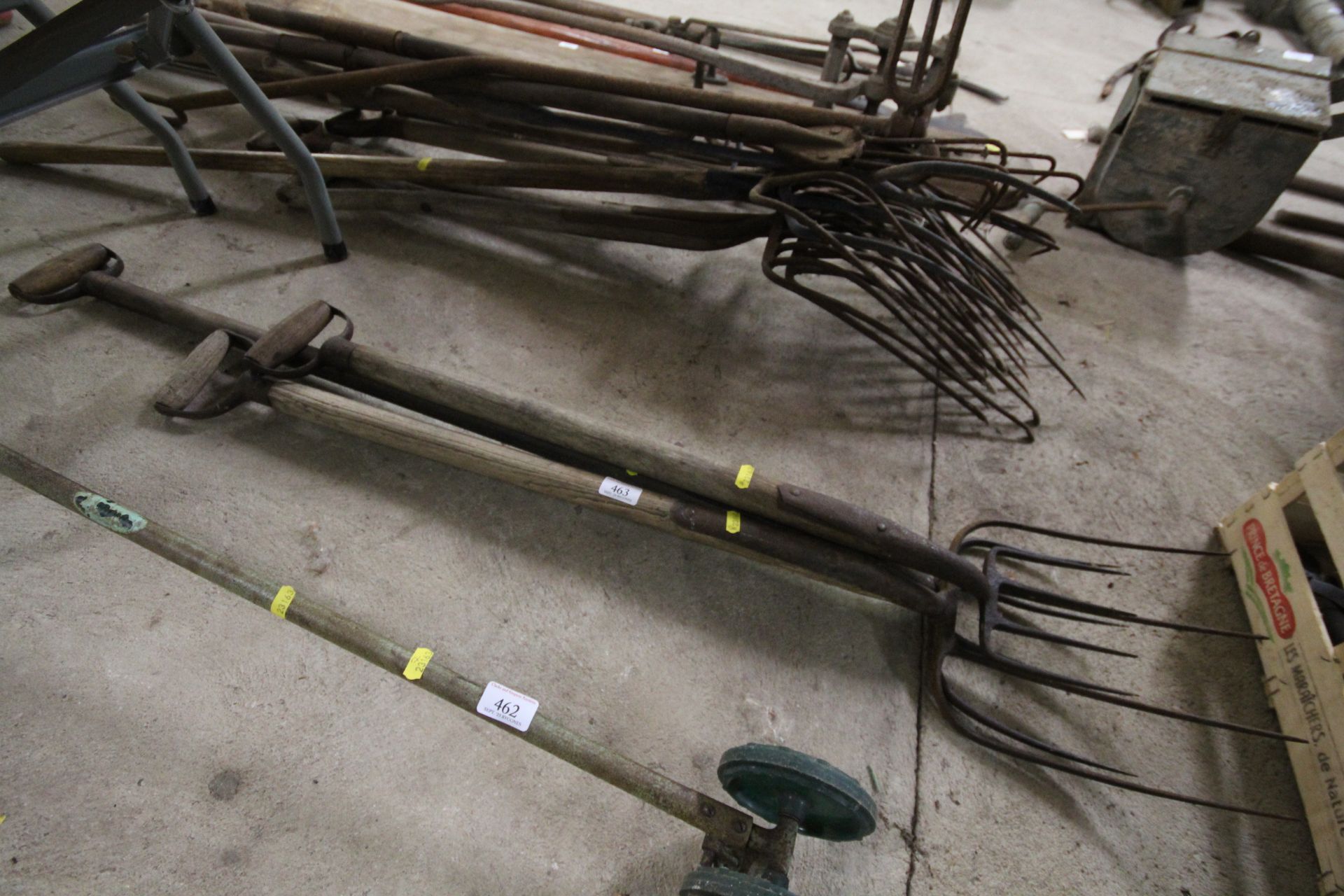 Three early various size mucking out forks with D shaped handles and wooden grips