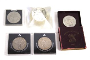 A collection of various commemorative coins to in