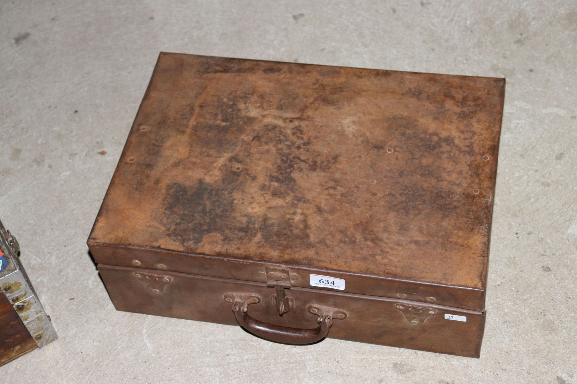 A small steel suitcase