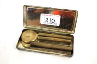 A 1920's press button punches and die set in origi