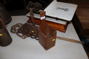 An antique pine candle box, a spoon rack and a car