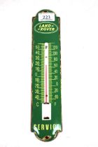 An enamel advertising garage thermometer for Land Rover Service